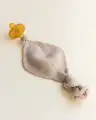 TITISAND-sidewithpacifier2.webp