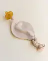 TITIOAT-sidewithpacifier2.webp