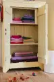 clothes and blankets in closet.jpg